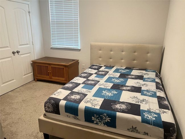 View of carpeted bedroom | Image 19