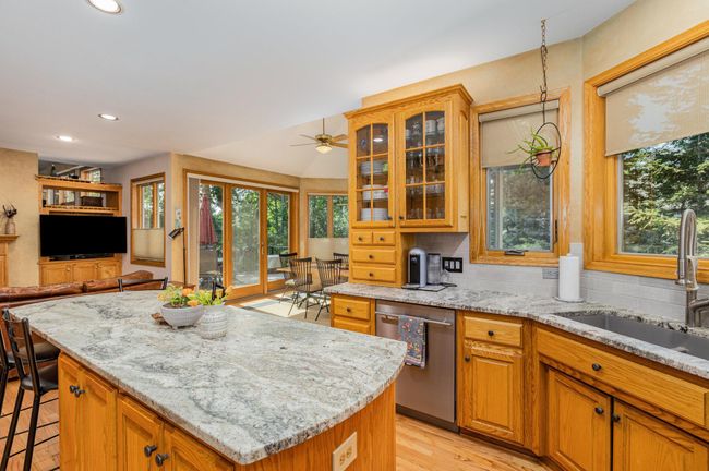 Gorgeous custom cabinetry and granite countertops - 9316 Yukon Ave S | Image 18