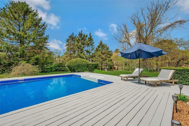 Outdoor pool with a deck | Image 20