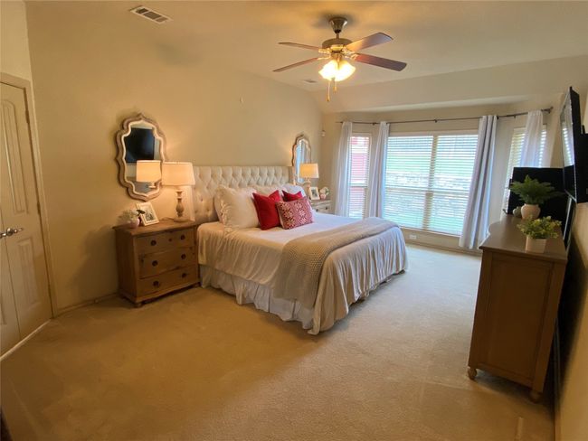 Bedroom with ceiling fan, light carpet, Windows and baseboards | Image 10