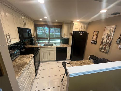 101-9351 Lime Bay Blvd, Tamarac, FL, 33321-3435 | Card Image