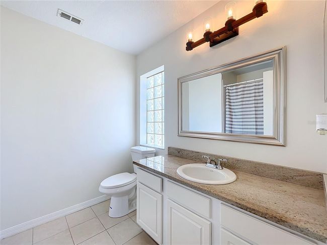 865 Scenic View Cir, House other with 3 bedrooms, 2 bathrooms and null parking in Minneola FL | Image 21