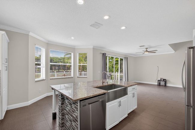 1196 Oakwater Dr, House other with 5 bedrooms, 3 bathrooms and null parking in Royal Palm Beach FL | Image 13
