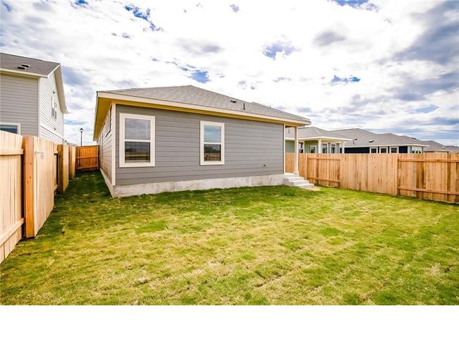Rear view of house featuring a fenced backyard | Image 24