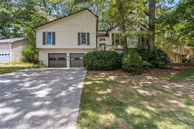 8645 Colony Club Drive, House other with 4 bedrooms, 3 bathrooms and 2 parking in Johns Creek GA | Image 1