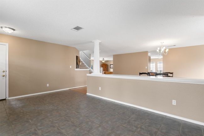 Welcoming entryway bonus room, perfect for musical enjoyment or relaxation. | Image 7