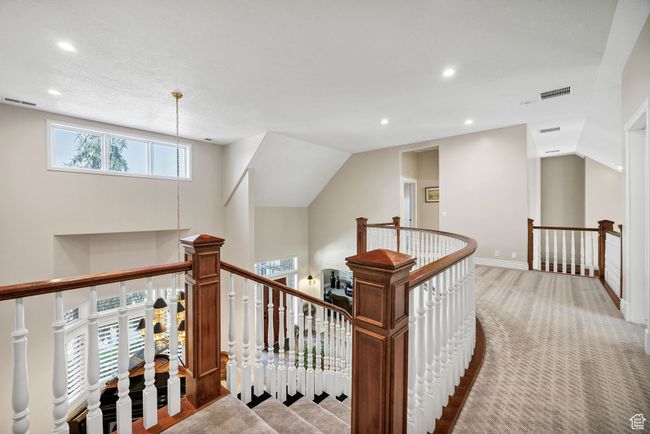 Hall featuring an upstairs landing, recessed lighting, and carpet flooring | Image 46