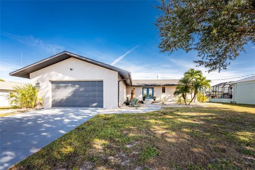 128 Sinclair St Se, PORT CHARLOTTE, FL, 33952-9141 | Card Image