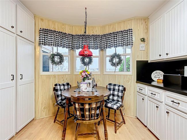 Dinette with a lot of cabinets | Image 15