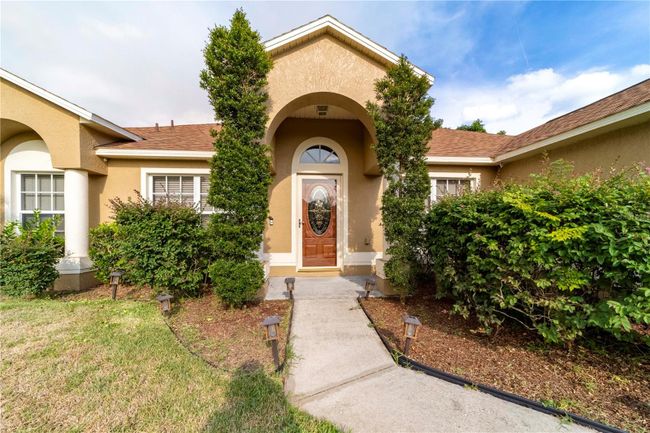 945 N Dean Circle, House other with 4 bedrooms, 2 bathrooms and null parking in Deltona FL | Image 2