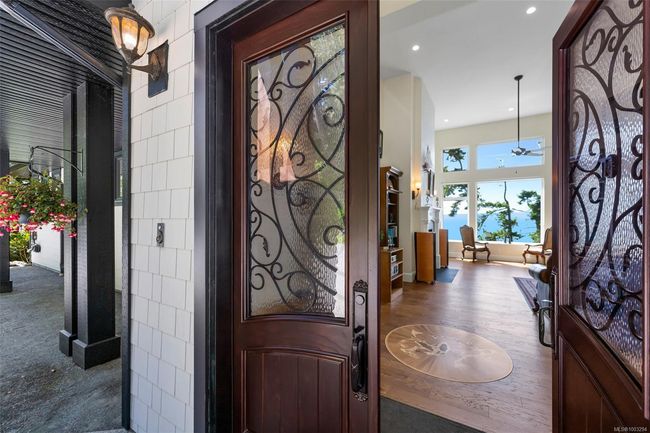 Entrance foyer featuring ceiling fan, recessed lighting, and wood finished floors | Image 36