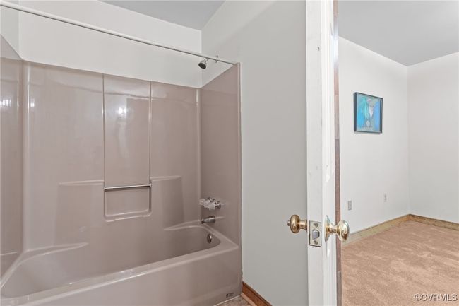 Full bath with tub / shower combination and baseboards | Image 16