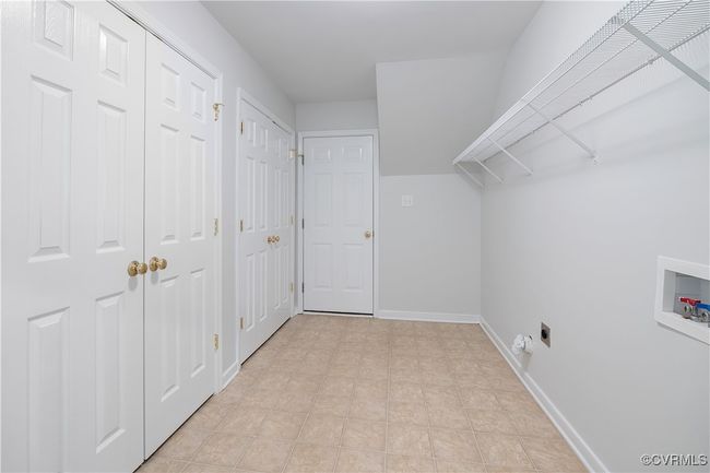 Clothes washing area with hookup for a washing machine, laundry area, and 2 closets | Image 22