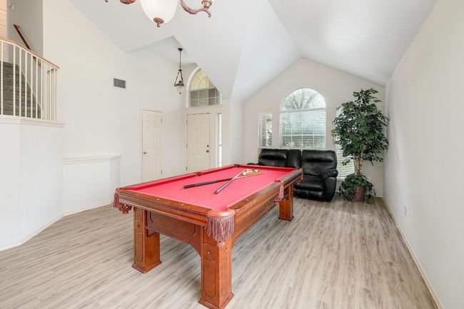 Formal living and dining room are currently being used as a billiards room! | Image 15