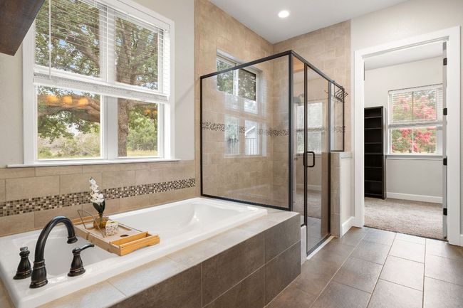 Separate soaking tub and large stand-up shower. | Image 20
