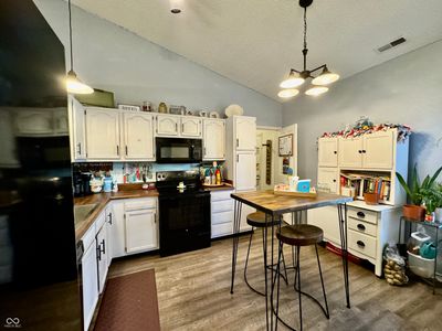 Newer fridge, new countertops and kitchen sink. | Image 3