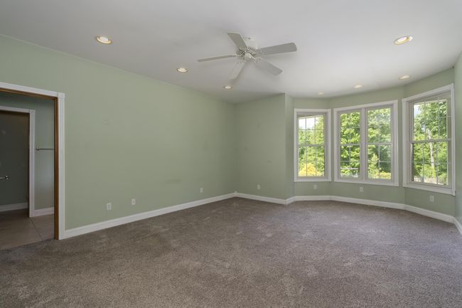 King Sized Primary Bedroom with 2 Giant Walk-in Closets | Image 18