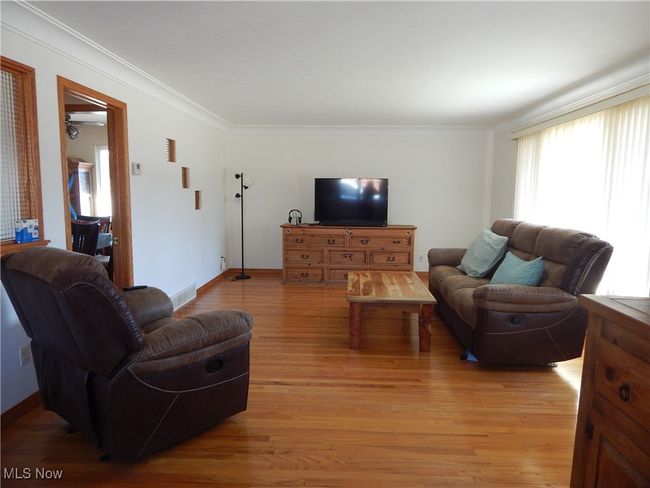 Living room adjoins 2 Dining areas. | Image 7