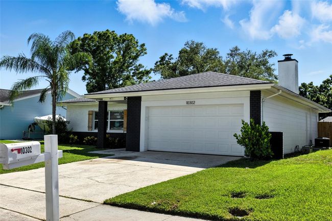 Fresh curb appeal with newer roof, windows, and HVAC — all replaced in 2019. | Image 52