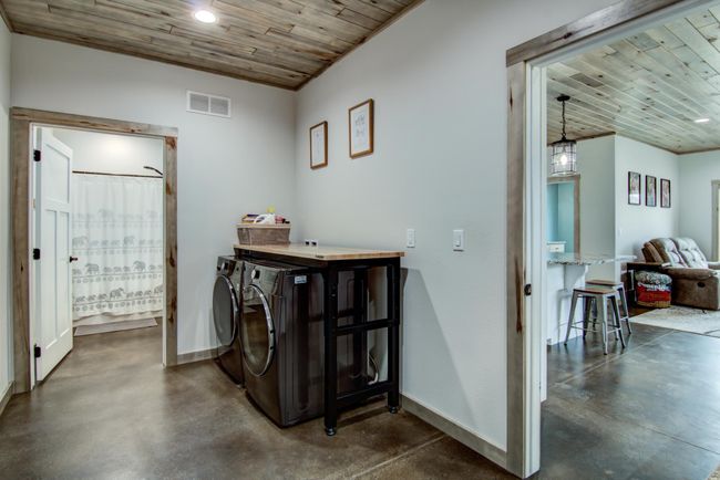 Laundry located in the back mudroom! Washer and Dryer are included in the sale. | Image 23
