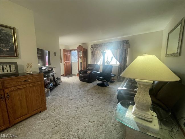 View of carpeted living room | Image 16