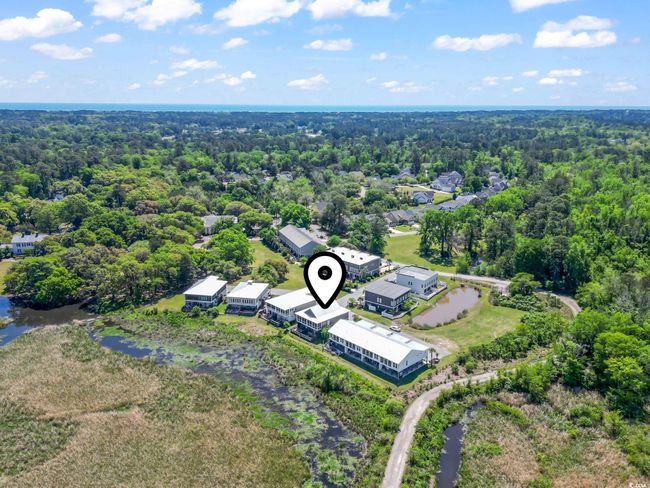 Bird's eye view with a forest view and a water view | Image 40