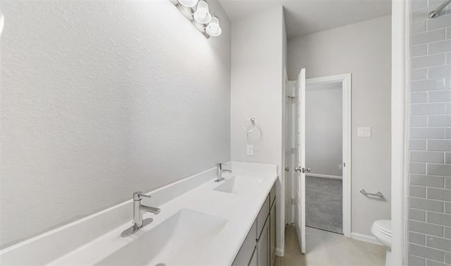 Bedroom 2/3 bath (*Photo not of actual home and used for illustration purposes only.) | Image 18