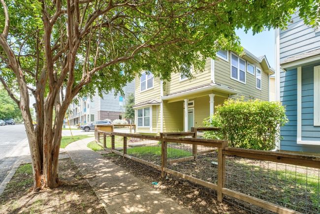 Sidewalk leading you to the home | Image 4