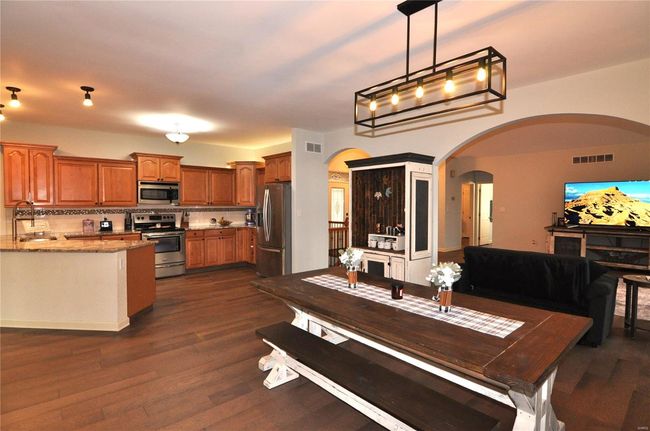 Open dining room & kitchen layout. | Image 10