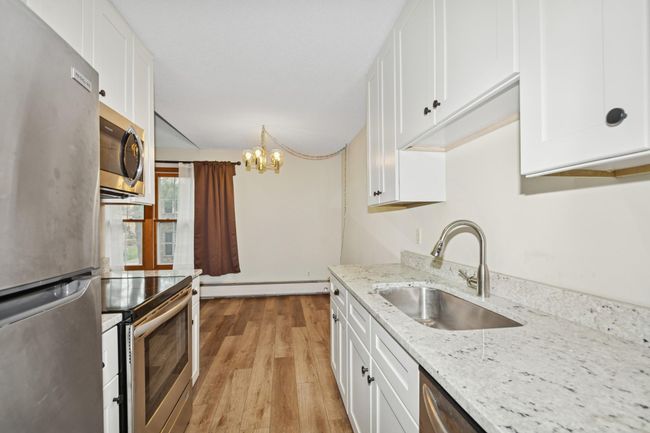 06_804OldSettlersTrl_Apt5_5_Kitchen_DownloadforMLS_2000x1333.jpg | Image 5