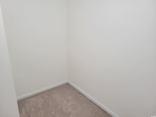 Unfurnished room with light carpet and baseboards | Image 12