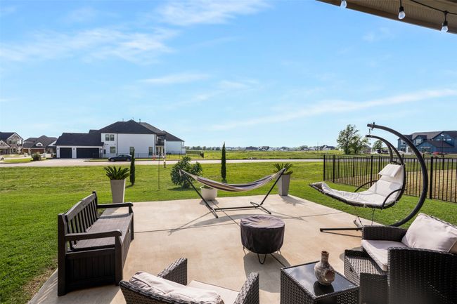 View of patio / terrace with fence | Image 34