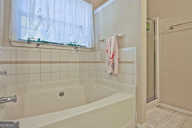 770 Walnut Creek Dr Nw, House other with 5 bedrooms, 4 bathrooms and 4 parking in Lilburn GA | Image 37