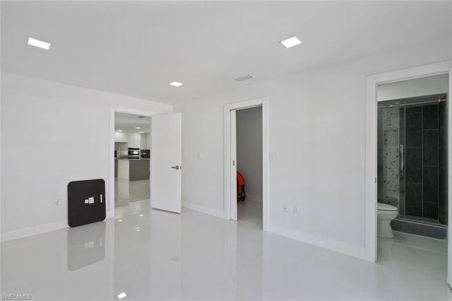 Unfurnished room featuring baseboards and visible vents | Image 15