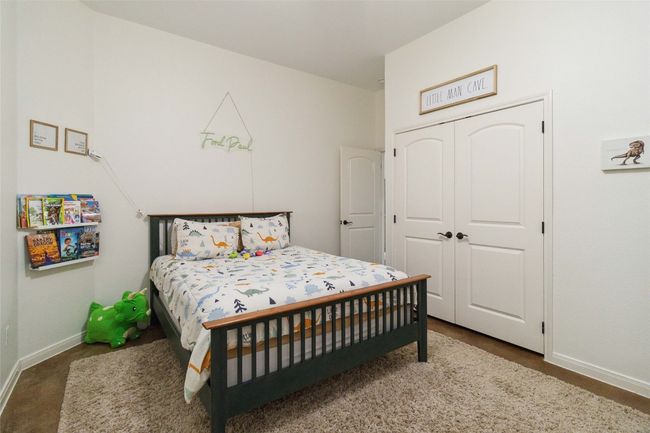 Bedroom featuring baseboards and a closet | Image 17