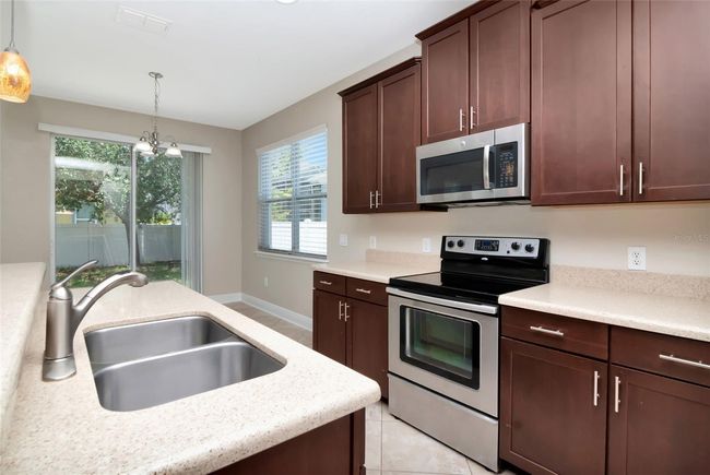 7703 S Fitzgerald St, House other with 4 bedrooms, 3 bathrooms and null parking in Tampa FL | Image 13