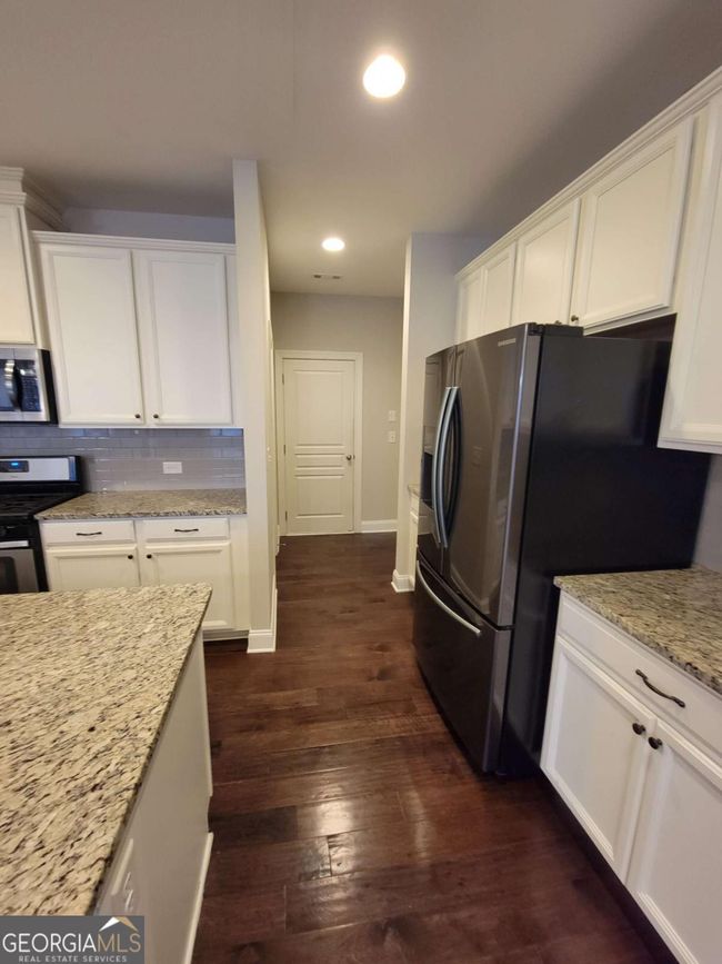 8265 Village Pl, Townhouse with 3 bedrooms, 3 bathrooms and 2 parking in Suwanee GA | Image 9