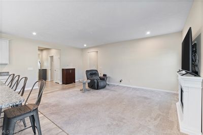 Living room with light hardwood / wood-style flooring | Image 3