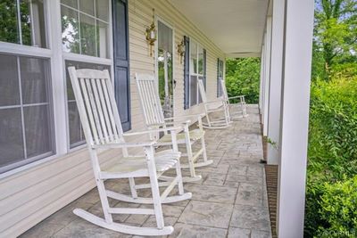 View of terrace featuring a porch | Image 3