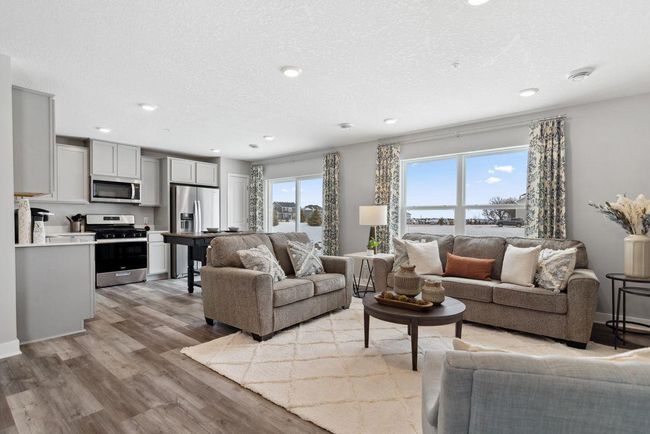 The simplicity of townhome living but the feel of a single-family home. Photo is of model home. Colors and options may vary. Ask Sales Agent for details. | Image 9