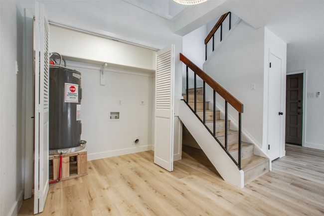 Dining area and laundry closet | Image 12