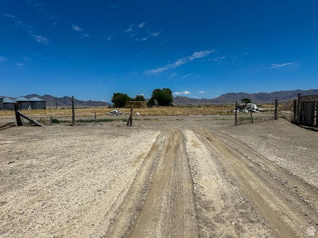View of dirt / gravel road featuring a view of countryside and a mountain view | Image 26