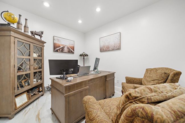 Quiet home office with neutral walls | Image 18
