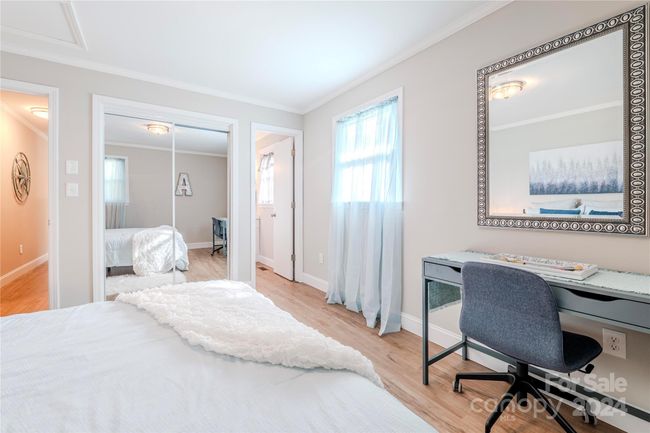 New mirrored closet doors reflect lots of light into the room! | Image 19