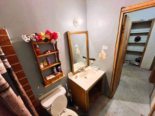 Bathroom featuring vanity and toilet | Image 18
