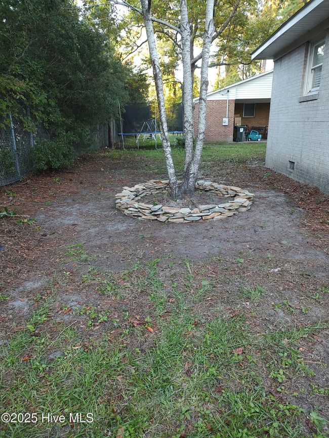 Backyard view. The school is right behind the fence. | Image 15