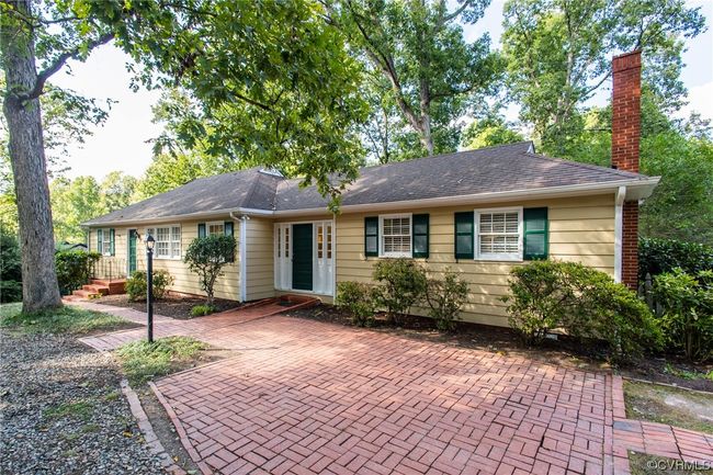 Welcome to Quaker Lane! Located in the heart of historic Bon Air, this charming updated cottage is ready for its new owner! | Image 1