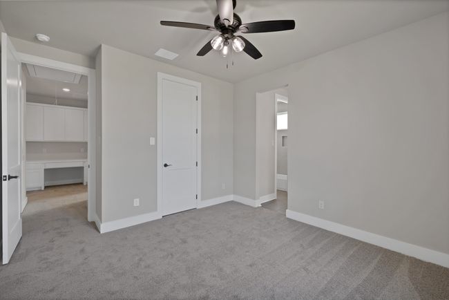 Unfurnished bedroom featuring carpet floors and a ceiling fan | Image 30