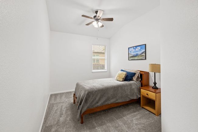 Bedroom featuring carpet floors, ceiling, and ceiling fan | Image 25