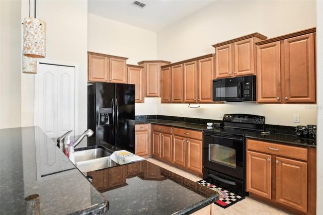 5832 Tarleton Way, House other with 4 bedrooms, 3 bathrooms and null parking in MOUNT DORA FL | Image 9